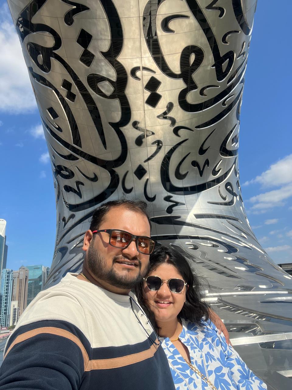 Salil and Eesha outside the Museum of the Future in Dubai